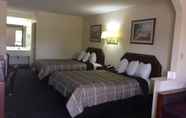 Bedroom 2 Luxury Inn and Suites