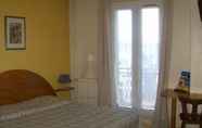 Bedroom 3 Hotel de Paris et des Voyageurs