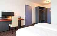 Bedroom 5 ACHAT Hotel Hockenheim