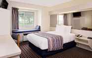 Bedroom 4 Microtel Inn & Suites by Wyndham Madison East