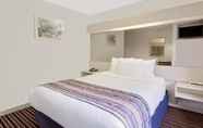Bedroom 3 Microtel Inn & Suites by Wyndham Madison East