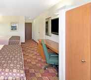 Bedroom 2 Microtel Inn & Suites by Wyndham Denver Airport
