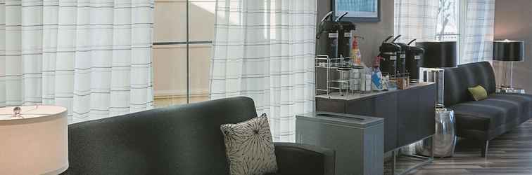 Lobby La Quinta Inn & Suites by Wyndham Orlando Airport North