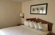 Bedroom 5 Days Inn & Suites by Wyndham Denver International Airport