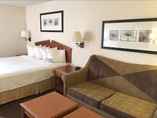 Bedroom 3 Days Inn & Suites by Wyndham Denver International Airport