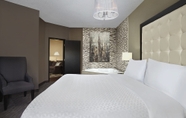 Bedroom 5 Four Points by Sheraton Hotel & Suites Calgary West