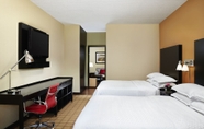 Bedroom 6 Four Points by Sheraton Hotel & Suites Calgary West