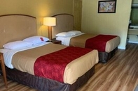 Bedroom AmeriVu Inn & Suites - Gilbertsville