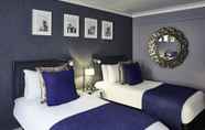 Bilik Tidur 3 Barons Court Hotel