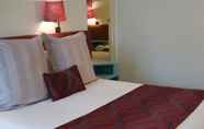 Kamar Tidur 7 SureStay Hotel by Best Western The Clarence on Melville