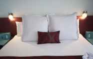 Kamar Tidur 6 SureStay Hotel by Best Western The Clarence on Melville