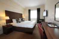 Kamar Tidur The Cairn Hotel