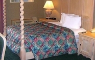 Bedroom 4 Econo Lodge