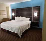 Bedroom 3 Stillwater Inn & Suites