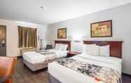 Bedroom 2 Days Inn by Wyndham Raleigh Glenwood-Crabtree