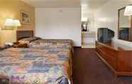 ห้องนอน 6 Belmont Inn & Suites