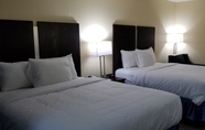 Bedroom 4 Days Inn by Wyndham Muscle Shoals Florence