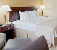 Kamar Tidur 5 Armoni Inn & Suites