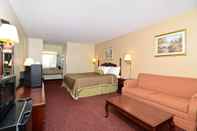Bedroom Travelers Inn and Suites
