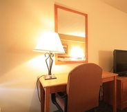 Bedroom 3 Ramada by Wyndham Sioux Falls Airport-Waterpark & Event Ctr