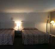 Bedroom 4 Alpha Inn & Suites