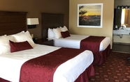 Bedroom 5 Days Inn & Suites by Wyndham Logan