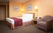 ห้องนอน 6 Days Inn by Wyndham West Allis/Milwaukee