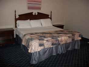 Kamar Tidur 4 Regency Inn & Suites