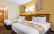 Bedroom 4 Quality Inn & Suites Near the Theme Parks