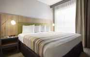 Kamar Tidur 4 Country Inn & Suites by Radisson, Flagstaff, AZ