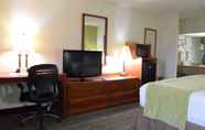 Bedroom 3 Ramada by Wyndham Savannah Gateway