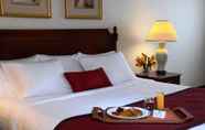 Kamar Tidur 6 Clinton Inn Hotel & Event Center