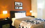 Bedroom 6 Sleep Inn & Suites Spring Lake - Fayetteville Near Fort Liberty