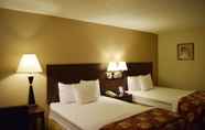 Kamar Tidur 7 Days Inn by Wyndham Orlando Conv. Center/International Dr