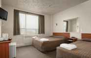 Bedroom 3 Kiwi International Hotel