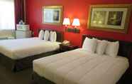 Bedroom 7 Bonanza Inn & Suites