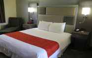 Bedroom 2 Bonanza Inn & Suites