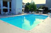 Swimming Pool SureStay Plus Hotel by Best Western Fayetteville