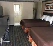 ห้องนอน 4 Whitney Inn & Suites
