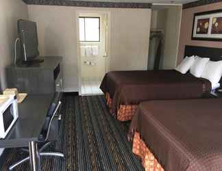 ห้องนอน 2 Whitney Inn & Suites