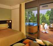 Bedroom 7 Du Lac et Du Parc Grand Resort