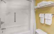 In-room Bathroom 6 Baymont by Wyndham Fayetteville