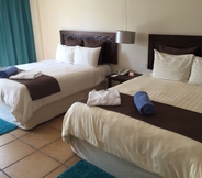 Kamar Tidur 2 Coronado Luxury Club & Suites