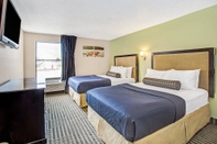 ห้องนอน Days Inn by Wyndham Great Lakes - N. Chicago