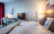 Bedroom 4 Leonardo Hotel Hannover Airport