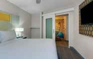 Bedroom 5 Holiday Inn Resort Orlando Suites - Waterpark, an IHG Hotel