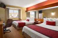 Bedroom Days Inn & Suites by Wyndham Lafayette IN