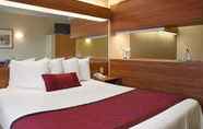 Bedroom 7 Days Inn & Suites by Wyndham Lafayette IN