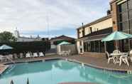 Swimming Pool 7 SureStay Plus Hotel by Best Western Greenwood