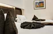 Kamar Tidur 4 Best Western Plus Hotel Universo